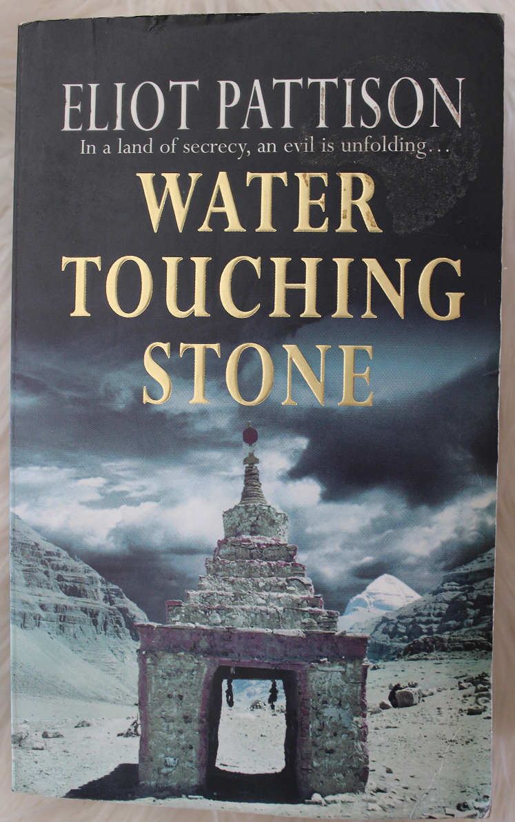 Water touching stone - Eliot Pattison